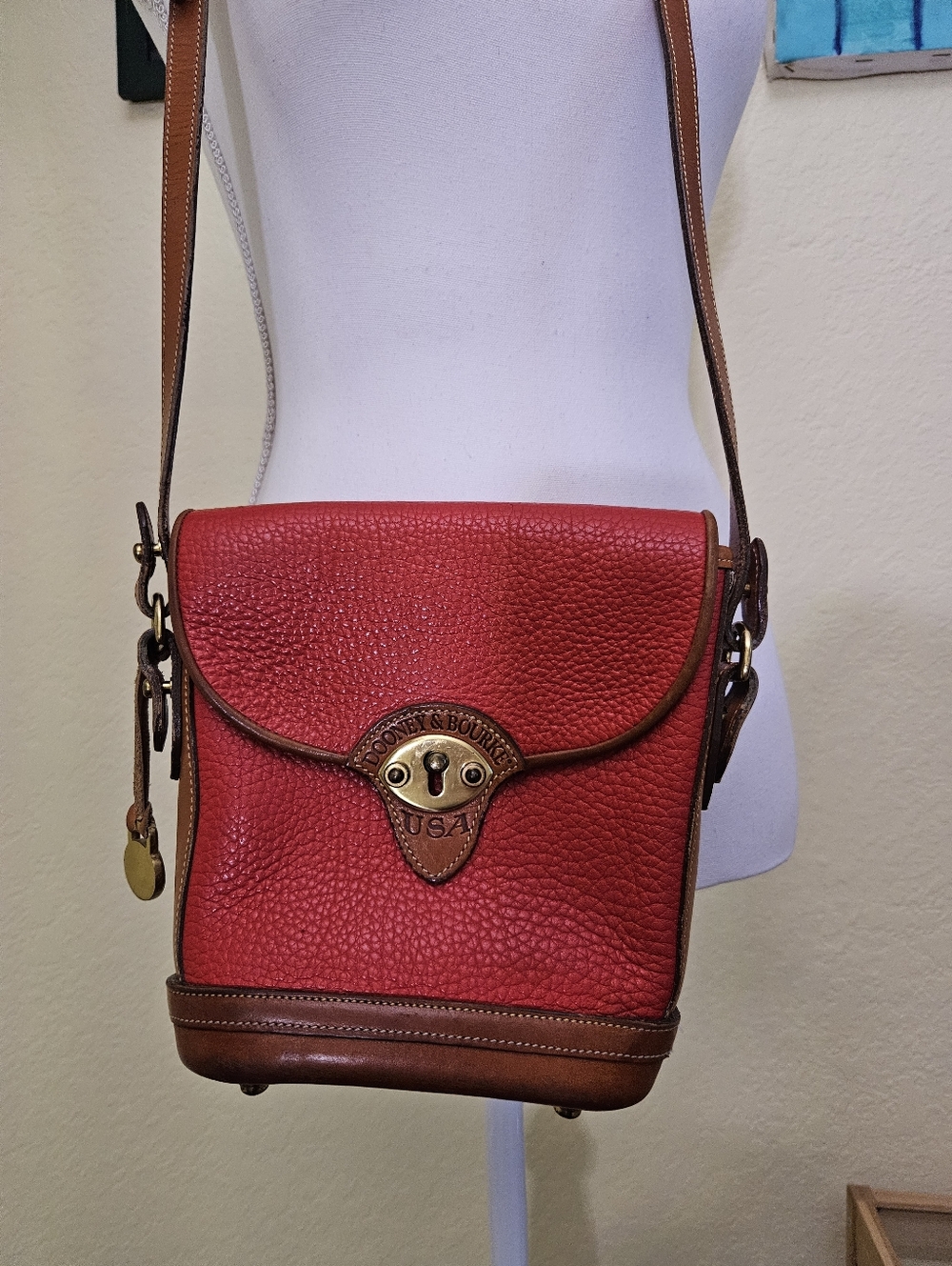 Vintage Dooney & Bourke AWL Cavalry Red and brown Crossbody purse with keychain.